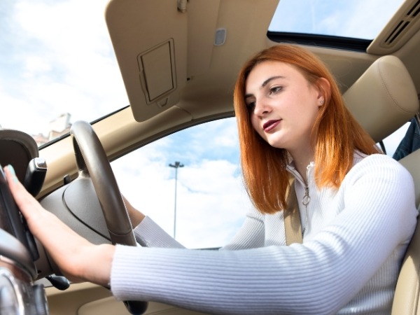 Woman Driving a Car
