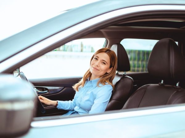 Woman Driving a Car