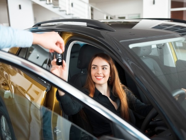 Woman Receiving Car Keys