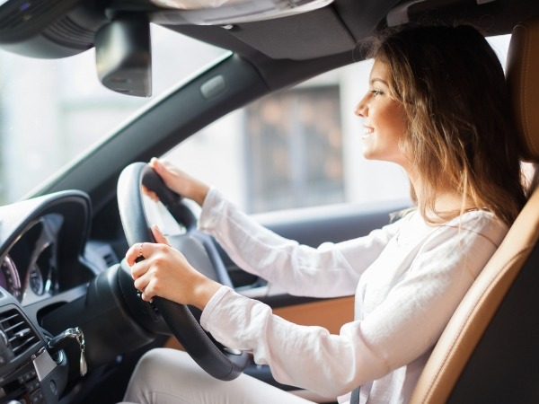 Woman Driving a Car
