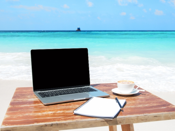 Laptop on a Table at a Beach