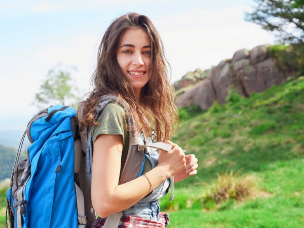 Woman Hiking a Mountain