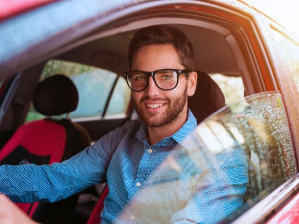 Man driving his Rental Car